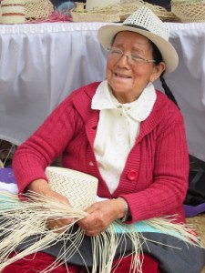 precious lady making a straw hat